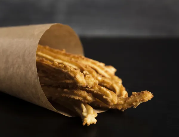 Spanischer Snack Von Churros In Einem Packpapier